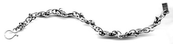 CURVE $320-sterling silver bracelet with individually twisted links (7 1/4" long)